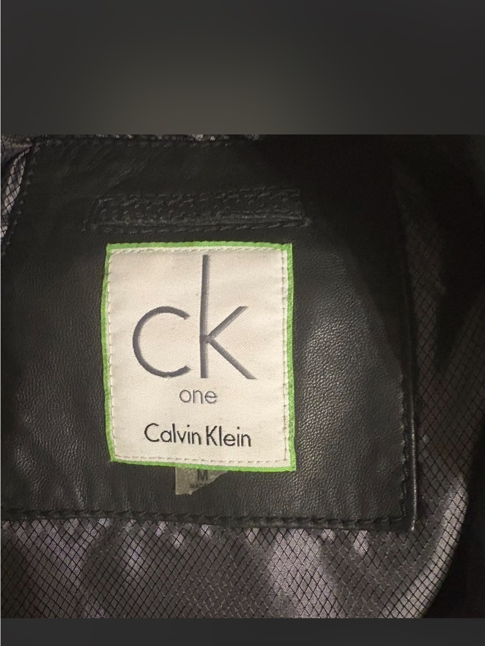Calvin Klein Black leather vest. Wear as biker look casual or dress it up